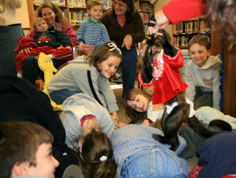 Capuchin at party with children