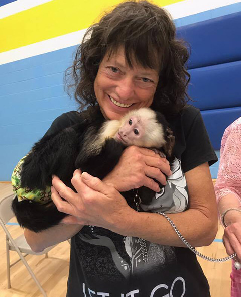 cuddling monkey